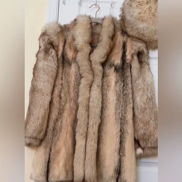 Luxurious Fur Coat with matching fur hat.